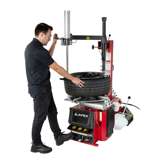 APEX AT26A Swing-Arm Tire Changer with Assist Tower In Use 