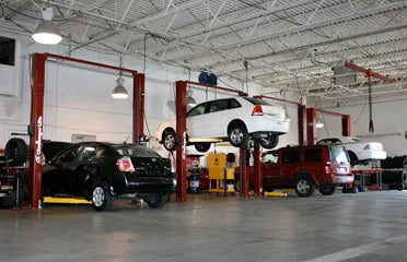 Challenger E10 2 post lift padded overhead shut off system