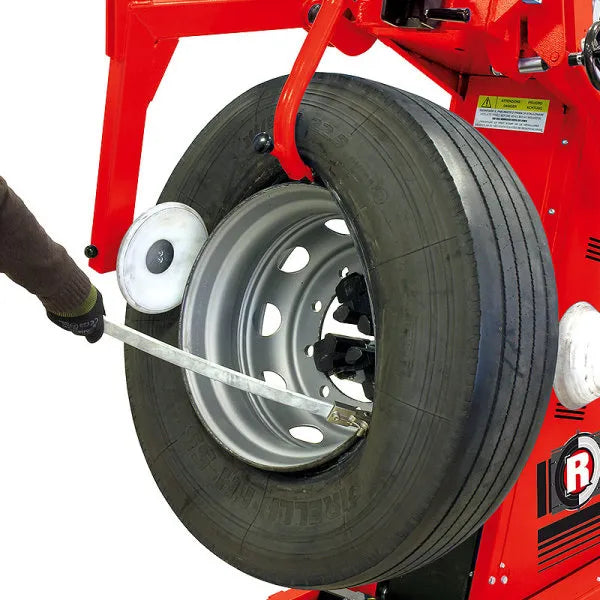 Adjustable arm positioning allows easy movement of bead breaker to lower drop center in front of the tire.